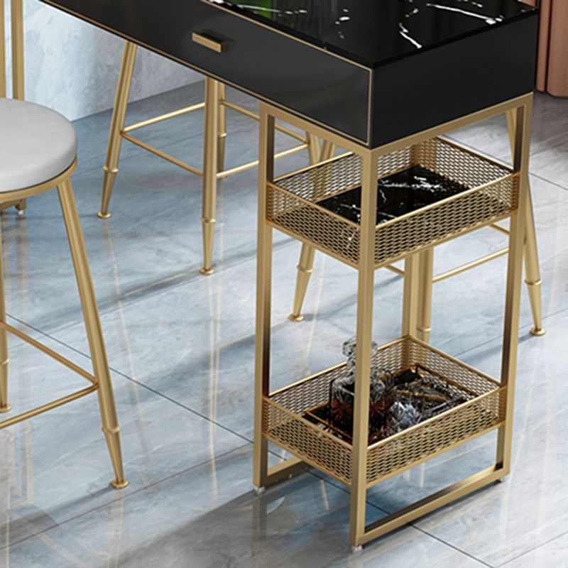 Bistro-bartafel van gesinterd steen, onderstel met goudkleurig frame en lades