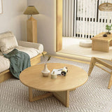 Tavolino rotondo scandinavo con gambe trasversali in legno di pino