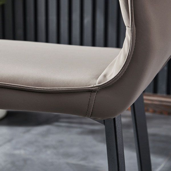 Contemporary PU Leather Dining Chairs Armless Solid Back Side Chairs for Home Use Clearhalo ' kitchen&dining_furn' 'Dining Chairs' 'Dining Tables & Seating' 'dining_chair' 'furn' 'furn_dining_chair' 'Furniture' 'furniture_dining_chair' 'Kitchen & Dining Furniture' 'kitchen' 1200x1200_6c1deb11-a3f4-441c-8d4e-703ed12befef