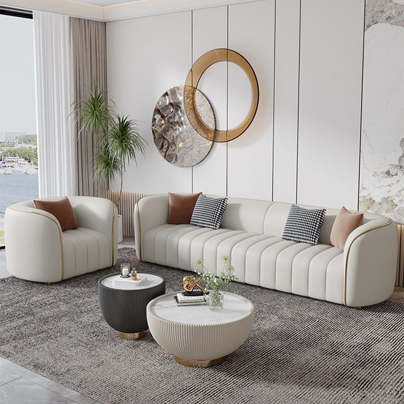 Echte lederen hellende armbank Moderne beige bank met kussens