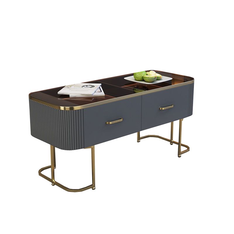 Eigentijdse salontafel met opberglade en gouden framebasis