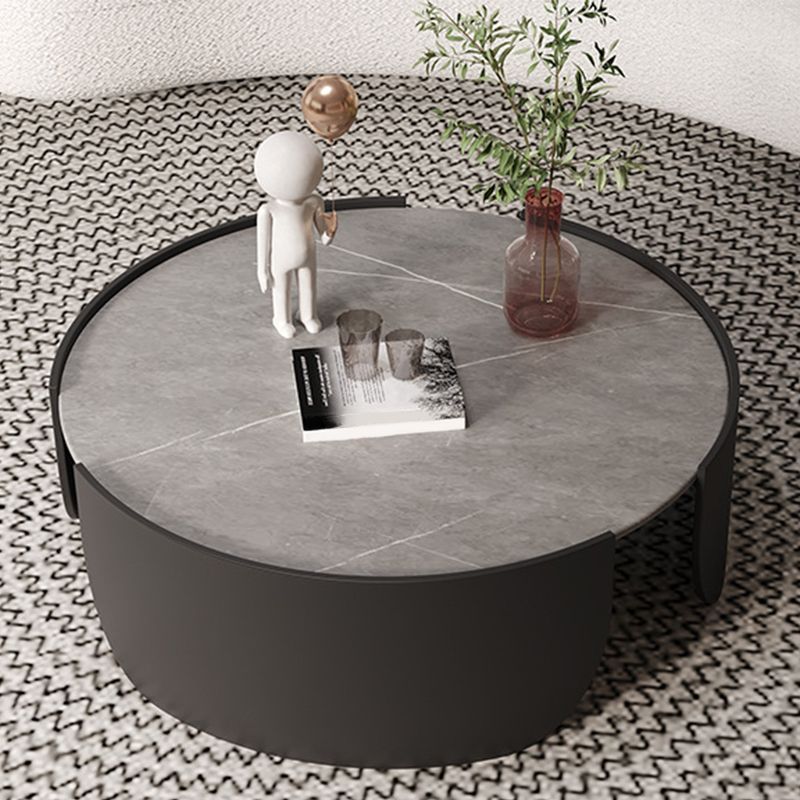 Mesa de centro con tapa de piedra Glam y mesa de cóctel redonda con base de tambor de acero