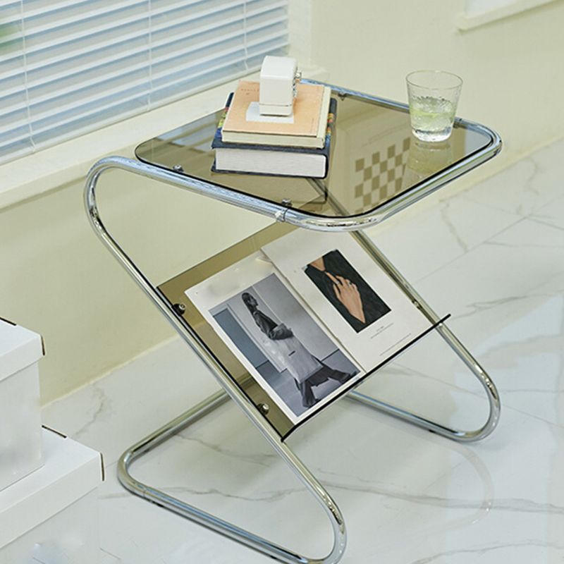 Mesa de vidrio de vidrio Top de la mesa de base abstracta de metal con soporte de revista