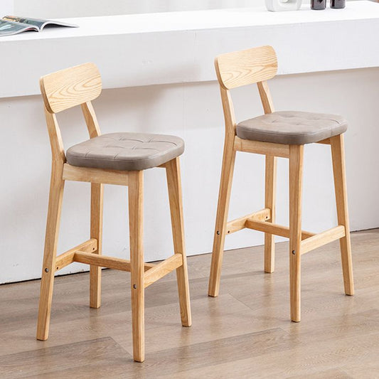 モダンなアームレスバックレストカウンタースツールオークウッドカフェスツールクッションとペダル付き