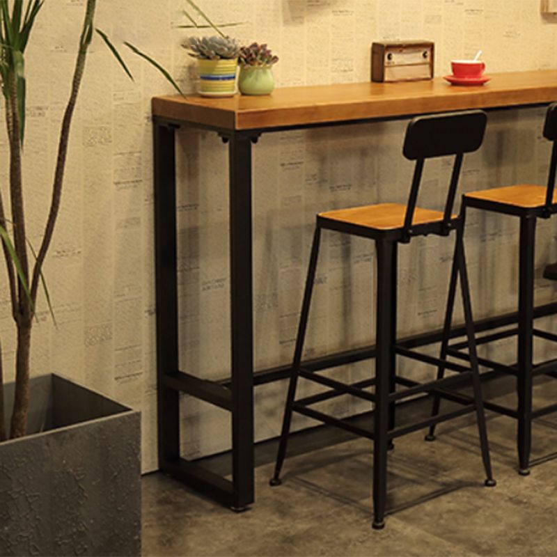 Industrial Style Rectangle Bar Table Solid Wood Bistro Bar Desk with Footrest Clearhalo 'Bar Furniture' 'Bar Tables' 'bar_tables' 'furn' 'furn_bar_tables' 'Furniture' 'Kitchen & Dining Furniture' 1200x1200_6f446a3d-5cec-4622-b2ef-d9fee0011cbb