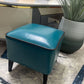 Mid Century Modern Pouf Ottoman Faux Leather Rectangle Ottoman with Chair Legs Clearhalo 'furn' 'furn_ottomans_poufs' 'Furniture' 'Living Room Furniture' 'Ottomans & Poufs' 'ottomans_poufs' 1200x1200_6f712c75-e8cc-40b0-8b89-8c5138f63dd4