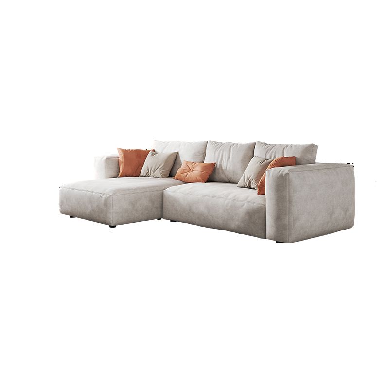 Sofá de brazo cuadrado de cuero falso con chaise moderno sofá de espalda suelta en gris