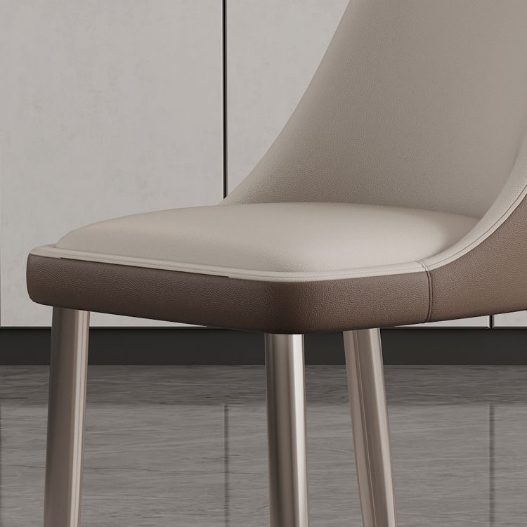 Sillas de comedor sin brazo de cuero sintética sillas laterales glamorosas con base de metal