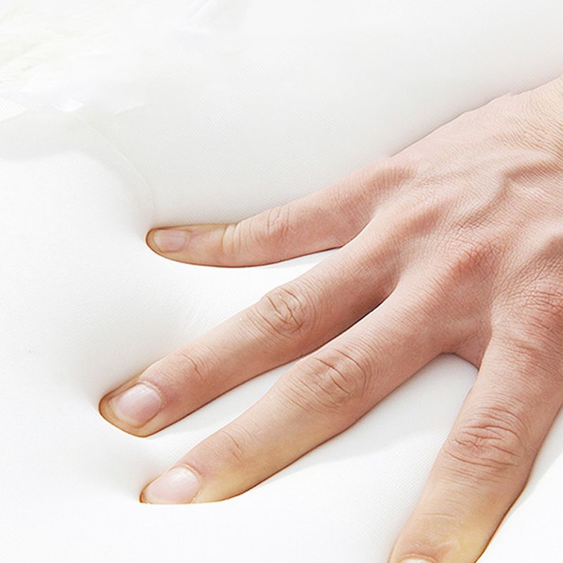 Sofá de durmiente de Futon Futon Glam Faux en almohada naranja incluida