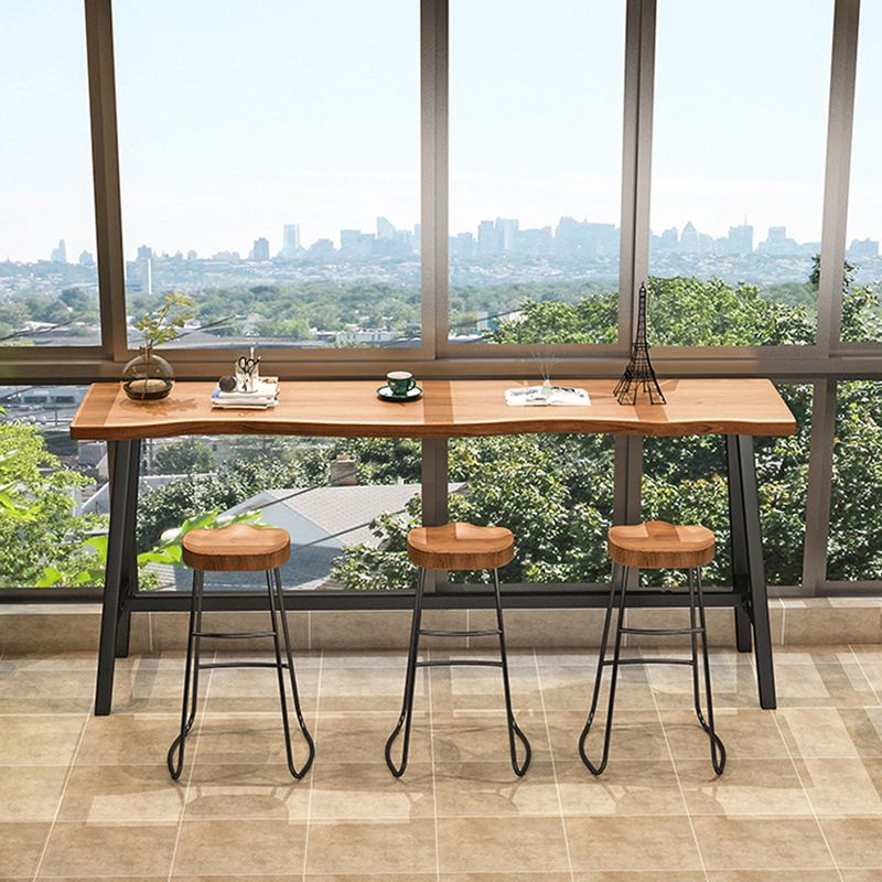 Living Room Modern Patio Bar Table Solid Wood Natural Footrest Bistro Bar Desk Clearhalo 'Bar Furniture' 'Bar Tables' 'bar_tables' 'furn' 'furn_bar_tables' 'Furniture' 'furniture_bar_tables' 'Kitchen & Dining Furniture' 1200x1200_7137aaf3-a627-4c37-8c4a-ca0a7df123fc