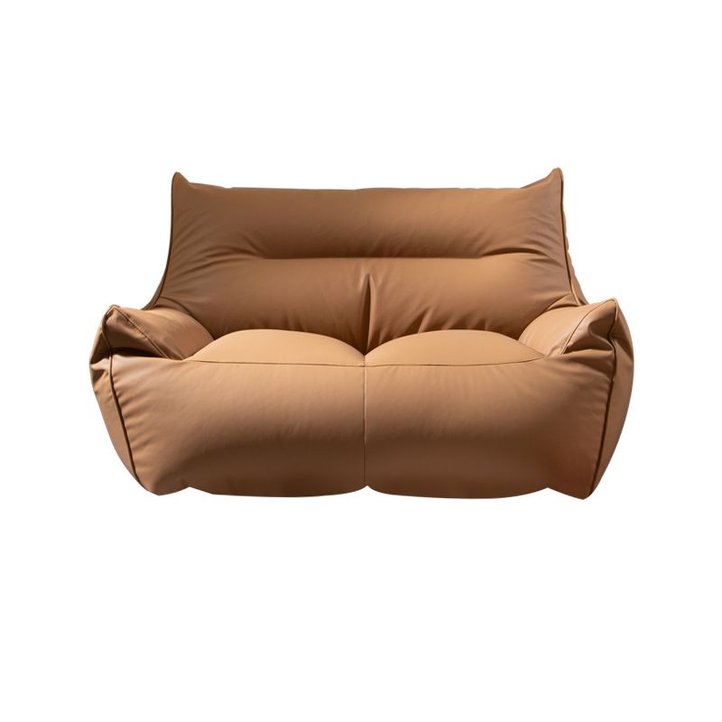 Moderno divano braccio svasato da cuscino cucito in pelle finta per soggiorno