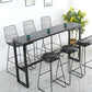 Bistrotisch im Industriestil mit Steinplatte und Metallsockel