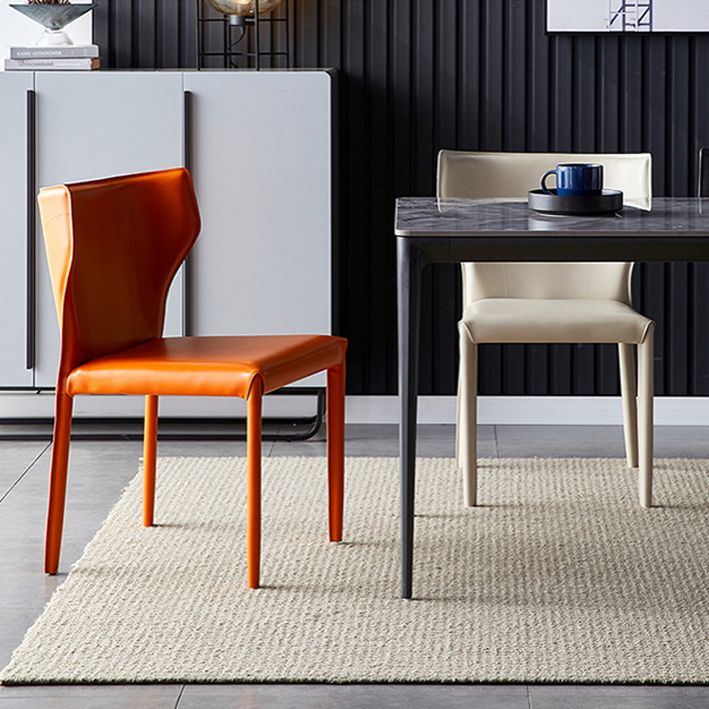 Contemporary Leather Dining Armless Chair Wingback Side Chair for Home Use Clearhalo 'Dining Chairs' 'Dining Tables & Seating' 'dining_chair' 'furn' 'furn_dining_chair' 'Furniture' 'furniture_dining_chair' 'Kitchen & Dining Furniture' 1200x1200_736dbda3-20a8-4107-9aee-1b7a2b102f3e