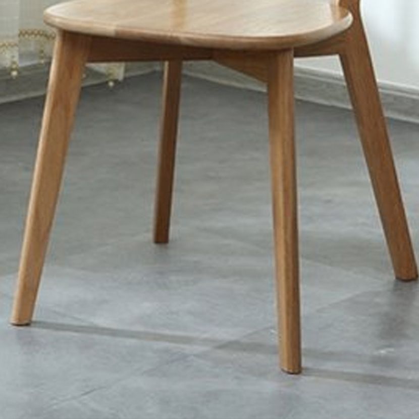 Silla de madera de respaldo sin brazo moderna con patas de roble para el comedor