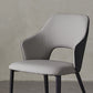 Eigentijdse kunstleren eetkamerstoelen met zwarte poten en fauteuil