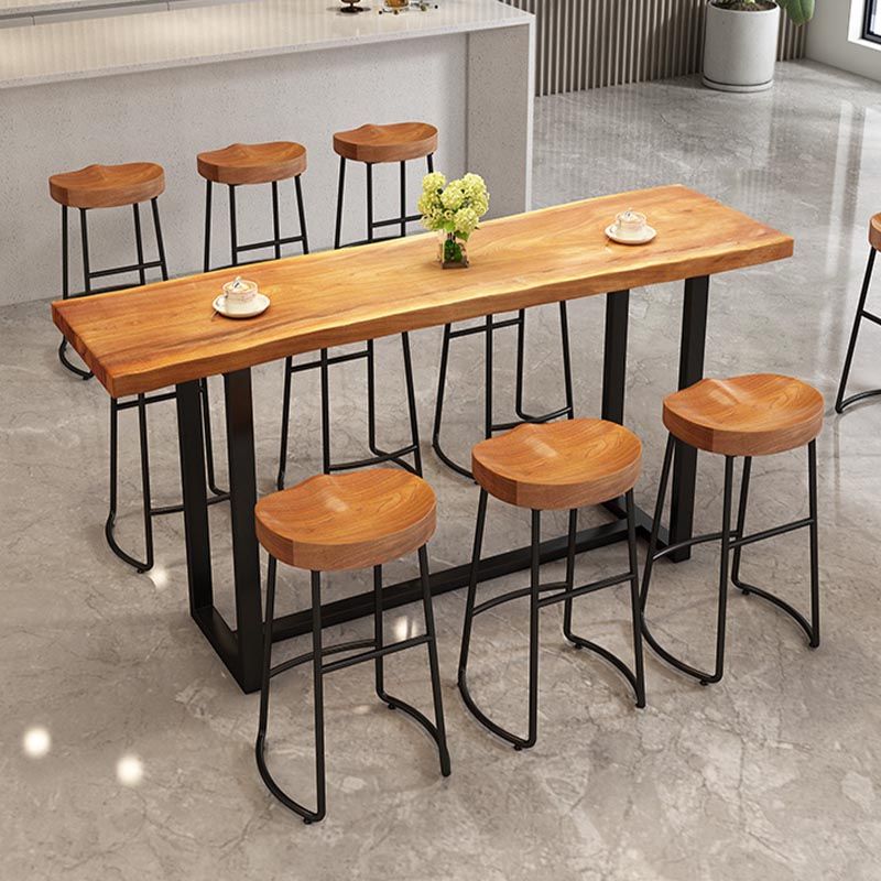 Taburete de bar contemporáneo de madera maciza Taburete de bar de metal con asiento contorneado