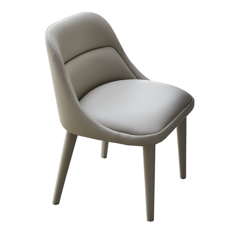 Eigentijds ontwerp armloze vaste stoel voor lederen eetkamerstoelen