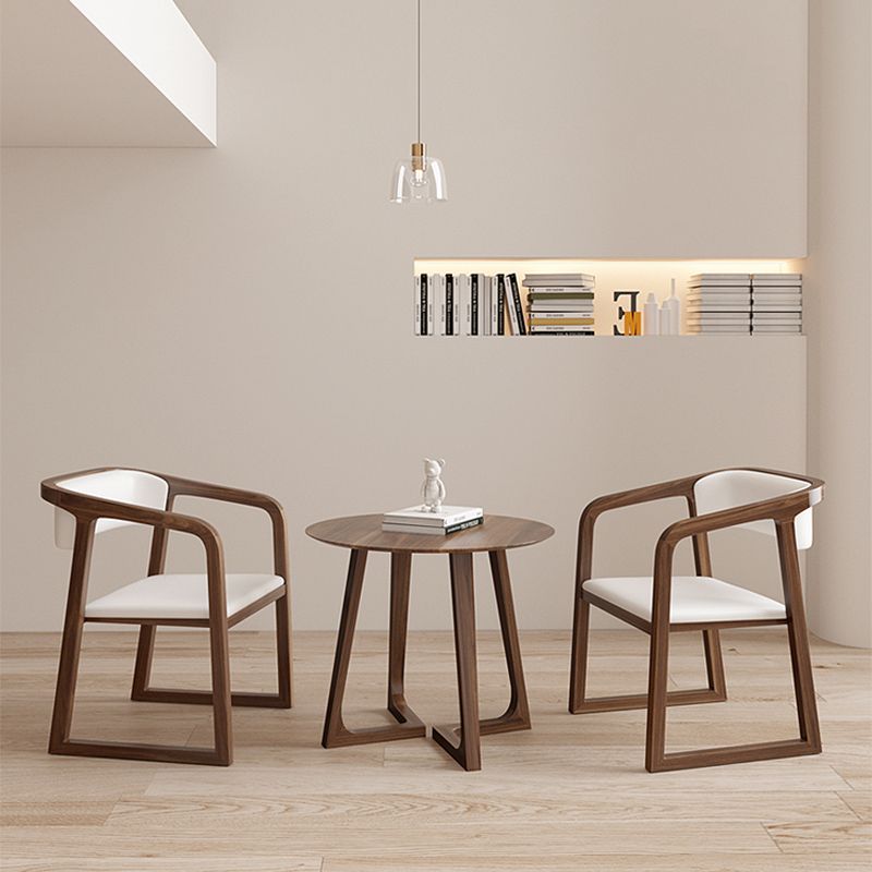 Tavolino a base di gambe incrociate in legno massiccio con cima rotonda