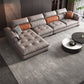 Tufted Pillow Top Arm Sofa with Chaise 133.86" W Faux Leather Sofa
