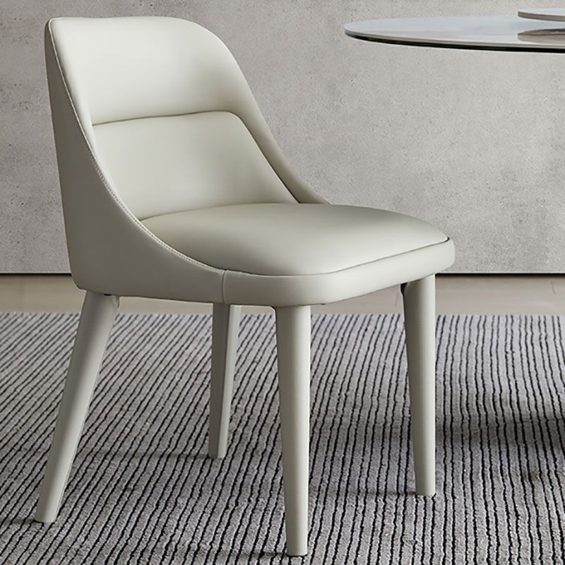 Eigentijds ontwerp armloze vaste stoel voor lederen eetkamerstoelen