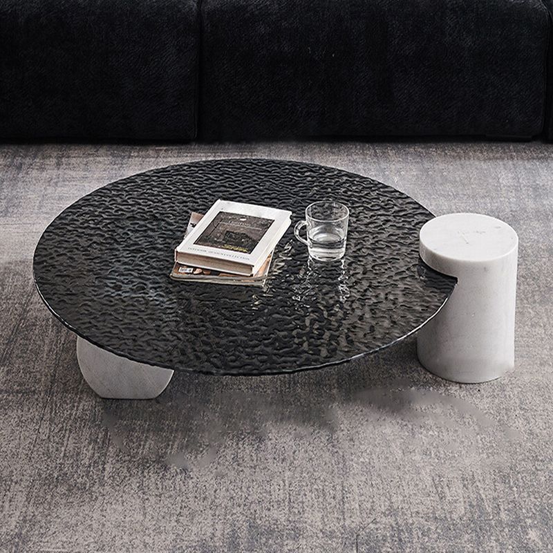 Table basse ronde avec dessus en verre Table de cocktail basse abstraite noire
