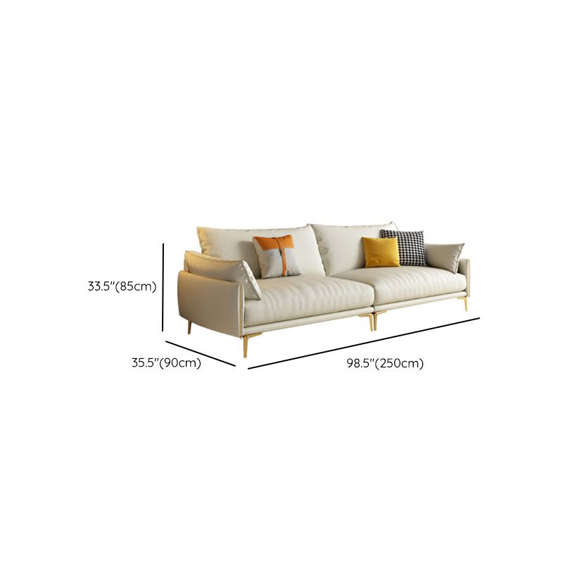 Sofá de brazo superior de almohada amarillo claro lujoso con almohadas de almohadillas