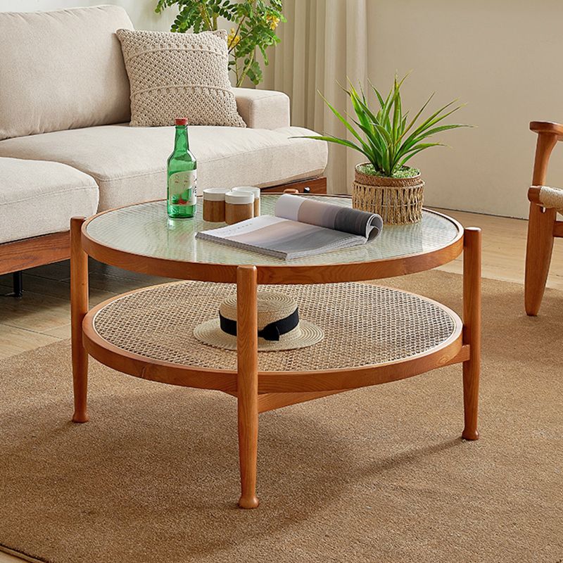 Tropical Round Cocktail Table Glass Top Coffee Cocktail Table with Shelf Clearhalo 'Coffee & Accent Tables' 'Coffee Tables' 'coffee_tables' 'furn' 'furn_coffee_tables' 'Furniture' 'Living Room Furniture' 1200x1200_79dfda02-636f-419f-9937-5c09f749f67f