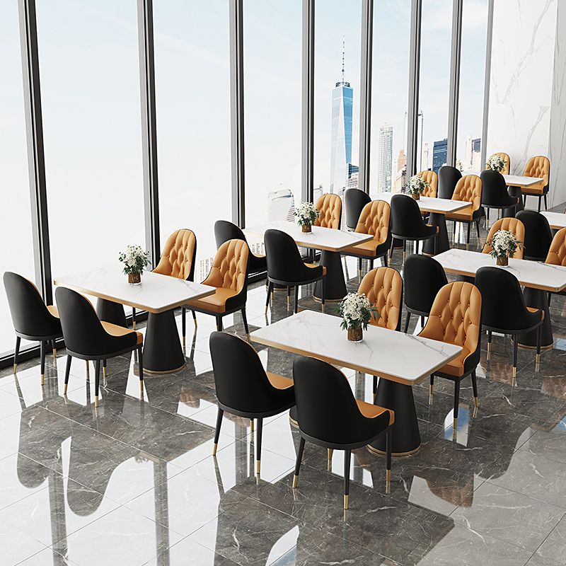 Silla de comedor de metal de cuero de estilo glamoroso para uso en el hogar