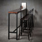 Wood Brown Bistro Accent Dining Table Industrial Rectangle Trestle Pub Table Clearhalo 'Bar Furniture' 'Bar Tables' 'bar_tables' 'furn' 'furn_bar_tables' 'Furniture' 'furniture_bar_tables' 'Kitchen & Dining Furniture' 1200x1200_7c20cec3-d3ef-4efd-a540-d7c1f60329c4