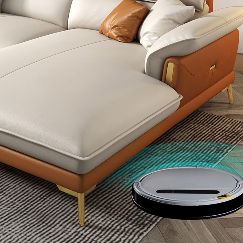 Glam lederen woonkamer zitplaatsen wijd uitlopende armkussens witte bank