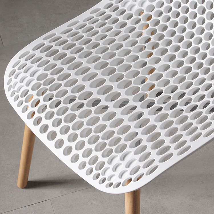 Scandinavian Style Plastic Dining Armless Chair Solid Back Chair with Wooden Legs Clearhalo ' kitchen&dining_furn' 'Dining Chairs' 'Dining Tables & Seating' 'dining_chair' 'furn' 'furn_dining_chair' 'Furniture' 'furniture_dining_chair' 'Kitchen & Dining Furniture' 'kitchen' 1200x1200_7c8e6fef-437b-44a0-9898-3c56b61c6dfd