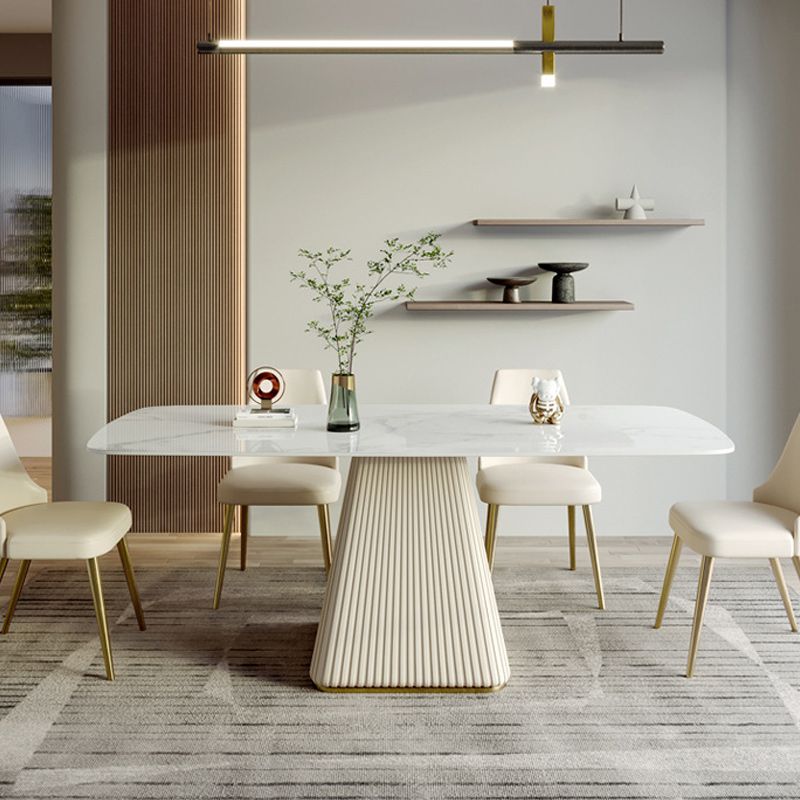 Mesa de comedor de comedor superior de piedra con base de pedestal en blanco