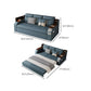 Canapé-lit bleu scandinave avec rangement et coussin en arrière