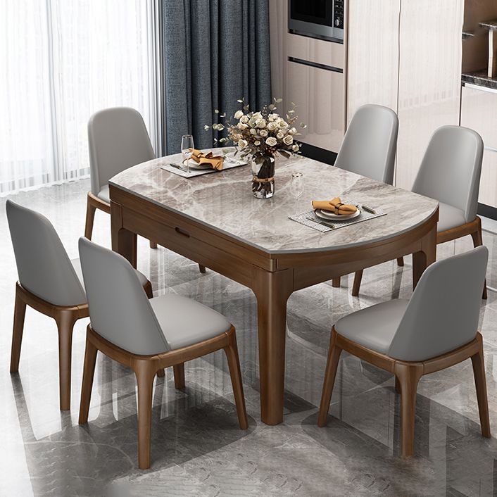 Mesa de comedor redonda moderna de piedra extensible para espacios pequeños en gris
