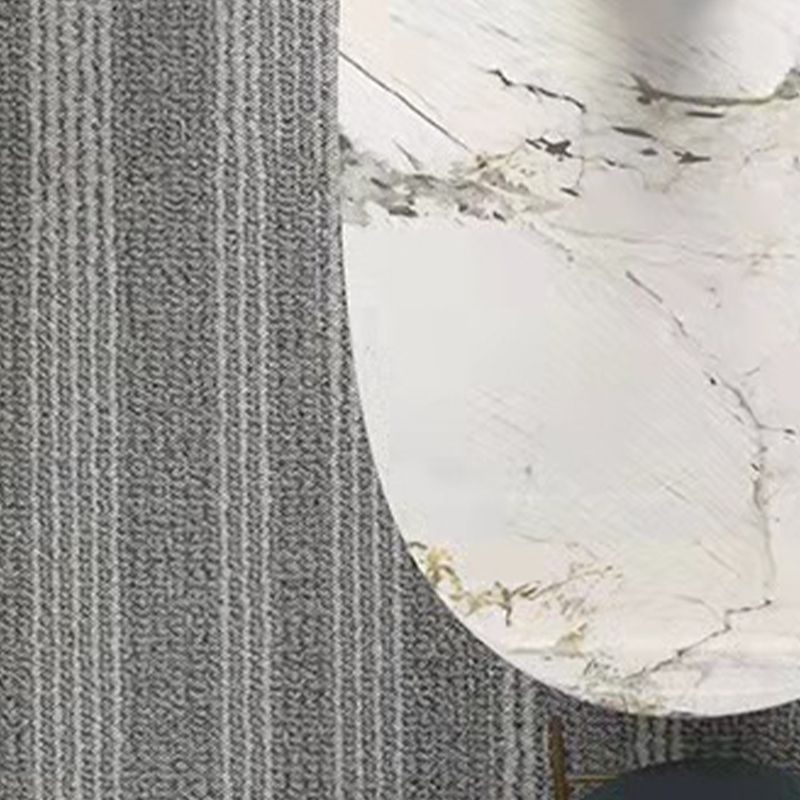 Mesa de comedor de piedra sinterizada de lujo con 3 patas en oro