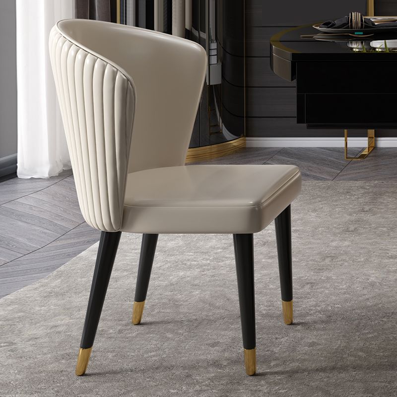 Glam Style Armless Chair Wood PU Leather Parsons Dining Chairs for Kitchen Clearhalo 'Dining Chairs' 'Dining Tables & Seating' 'dining_chair' 'furn' 'furn_dining_chair' 'Furniture' 'furniture_dining_chair' 'Kitchen & Dining Furniture' 1200x1200_7f154a9b-38bc-4de6-8844-7d2fbd3e4097