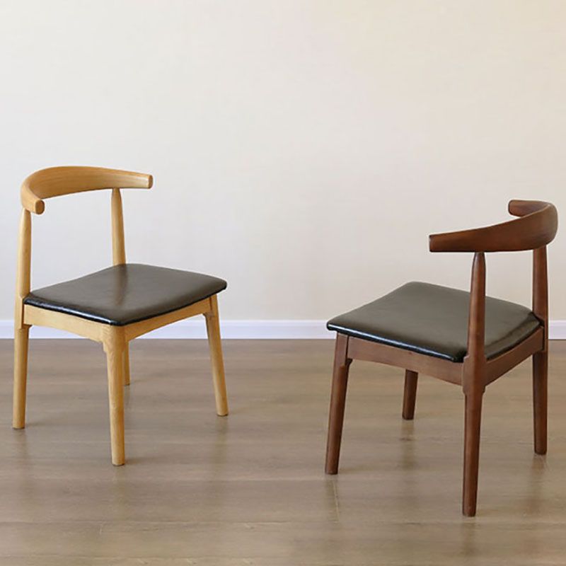 Sillas de comedor de cuero PU Diseño industrial Silla de comedor de espalda abierta