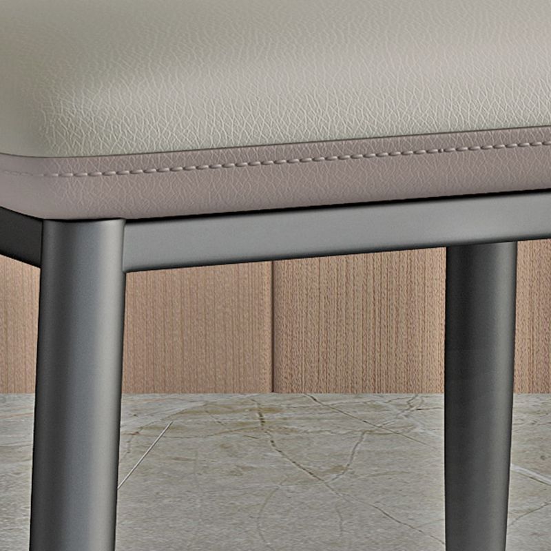 Minimalist Wingback Armless Dining Chair Faux Leather Side Chair Clearhalo 'Dining Chairs' 'Dining Tables & Seating' 'dining_chair' 'furn' 'furn_dining_chair' 'Furniture' 'Kitchen & Dining Furniture' 1200x1200_7f9b2def-2073-44d3-a229-9b6dc2c77599