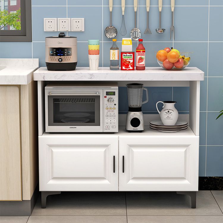 モダンなダイニングルームの島のテーブル貯蔵キャビネット付きの大理石の準備テーブル