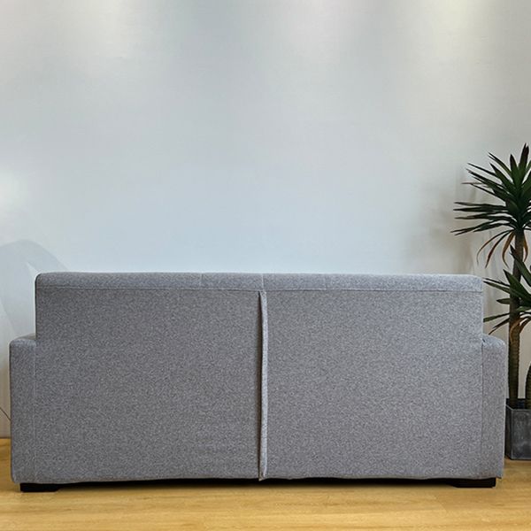 Salon contemporain biscuit arrière carré bras argent canapé stationnaire