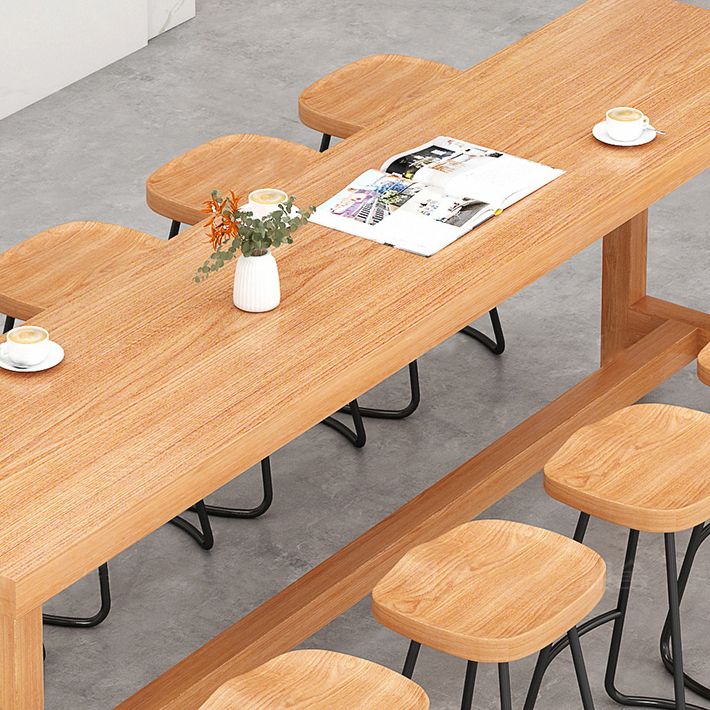 Modern Beige Wood Bar Dining Table Rectangle Indoor Bistro Table with Footrest Clearhalo 'Bar Furniture' 'Bar Tables' 'bar_tables' 'furn' 'furn_bar_tables' 'Furniture' 'furniture_bar_tables' 'Kitchen & Dining Furniture' 1200x1200_80100d29-4b62-4694-a662-7b29a1e0857b