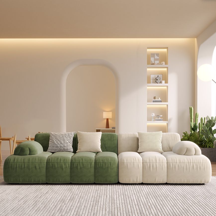 Sedute scandinaviane in finta pelle verde trapuntata braccio salotto