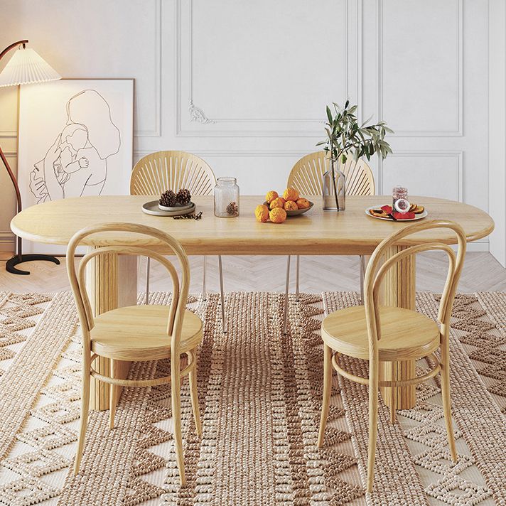 Mesa de comedor ovalada moderna de madera maciza con pedestal doble en color natural