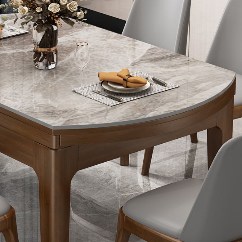 Mesa de comedor redonda moderna de piedra extensible para espacios pequeños en gris