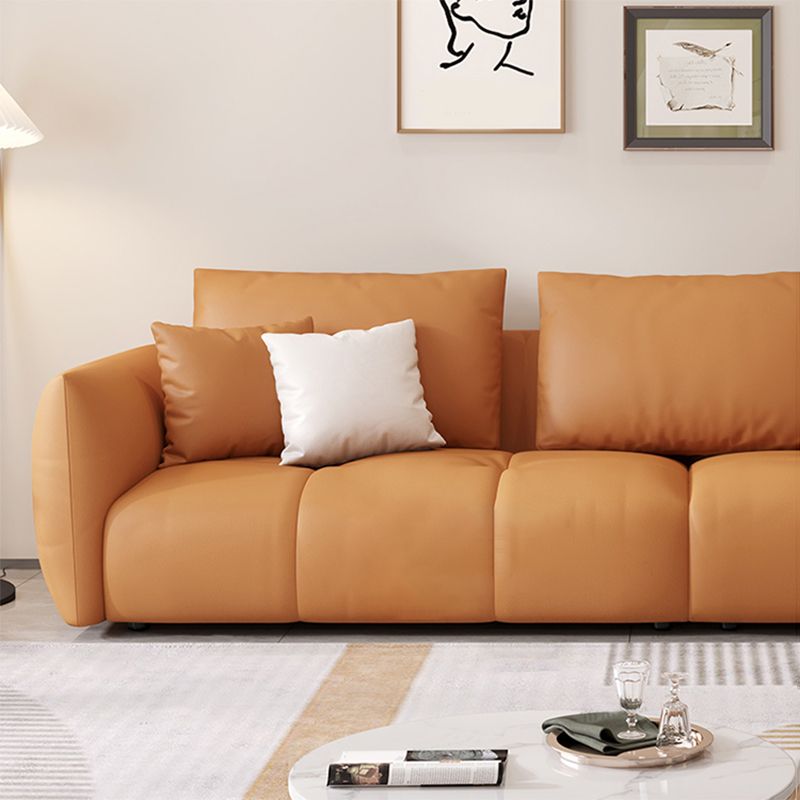 スカンジナビアの本革のオレンジ枕正方形の腕のリビングルームの座席