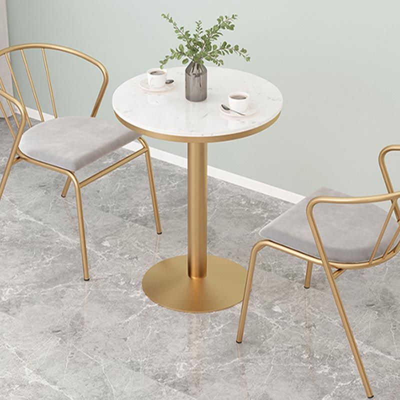 Tavolo da pranzo rotondo tradizionale tavolo in marmo con base in metallo oro