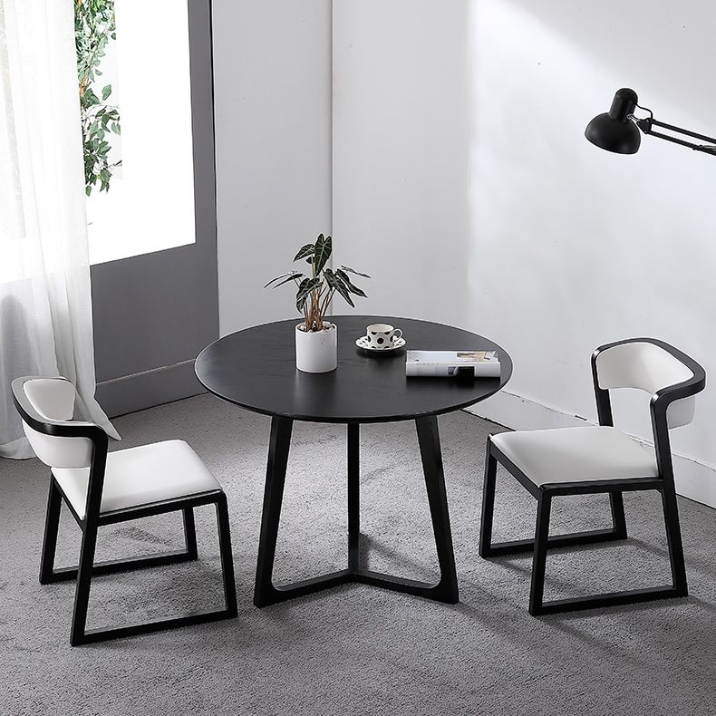 Black Table with Ash Wood Frame Modern Round Dining Table for Home Clearhalo 'Dining Tables & Seating' 'Dining Tables' 'dining_table' 'furn' 'furn_dining_table' 'Furniture' 'Kitchen & Dining Furniture' 1200x1200_8483c6e6-a106-4a70-bbfa-82dda94cebef