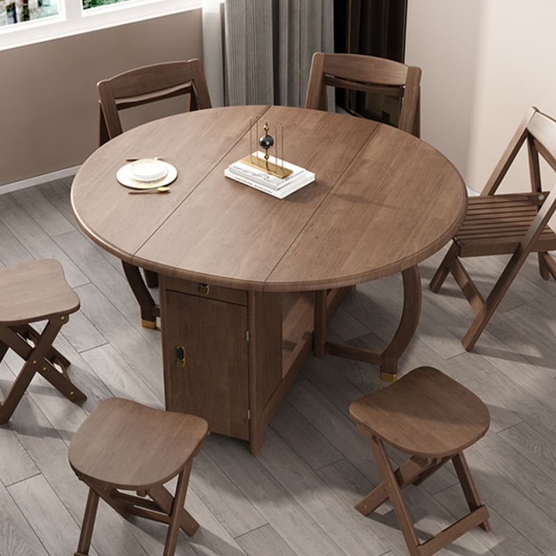 Foldable Rubber Wood Dining Table Medieval Modern Round Table with Storage Trestle Base Clearhalo 'Dining Tables & Seating' 'Dining Tables' 'dining_table' 'furn' 'furn_dining_table' 'Furniture' 'furniture_dining_table' 'Kitchen & Dining Furniture' 'kitchen' 'kitchen_dining_table' 1200x1200_84918c9b-94be-4e91-a980-0687158e520f