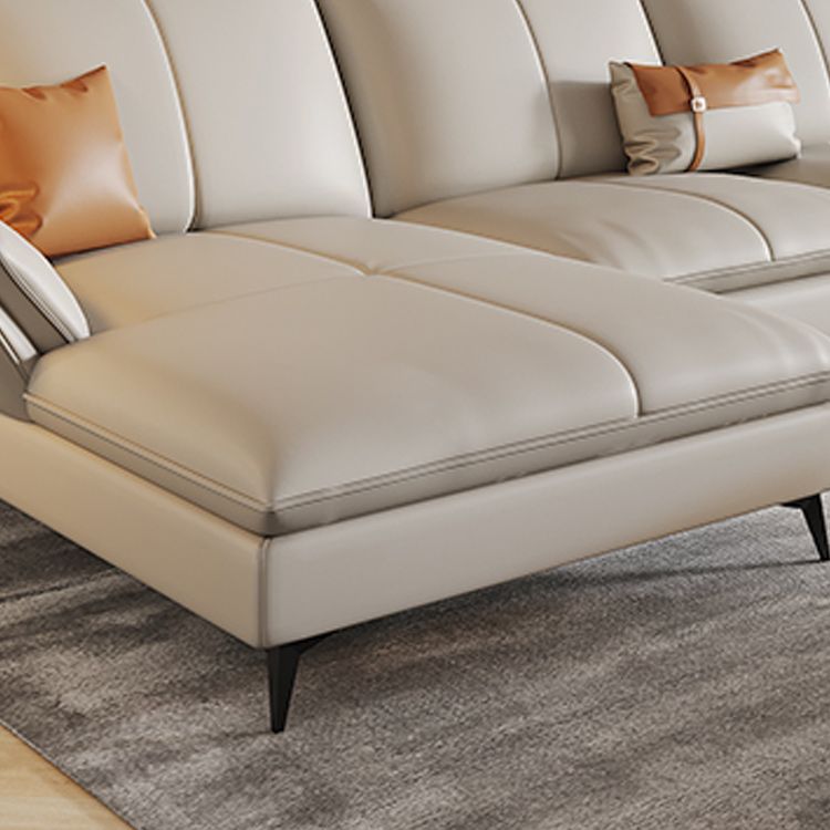 Sofa sectionnel contemporain sectionnel en cuir beige avec oreillers