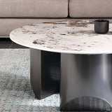 Tavolino bianco glam con 3 gambe in acciaio nero e top in pietra